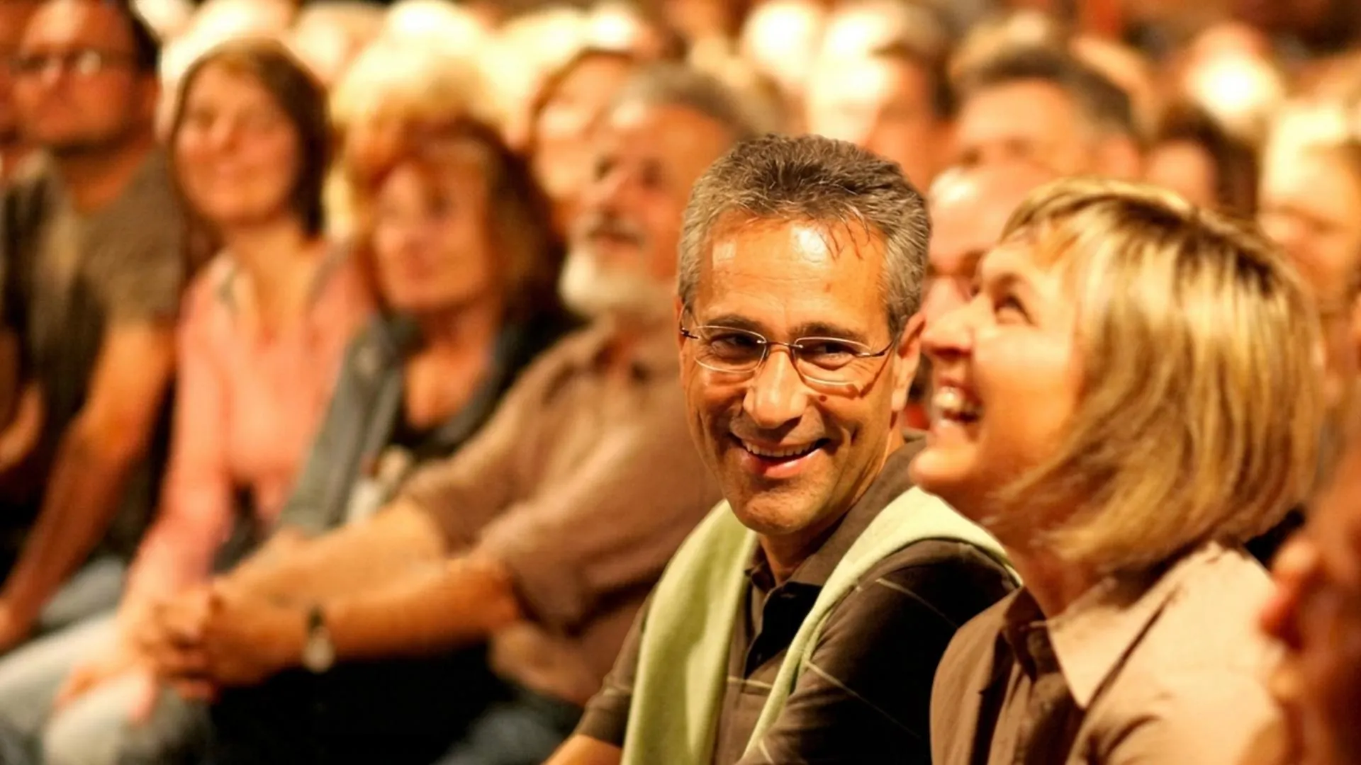 John's audience laughing